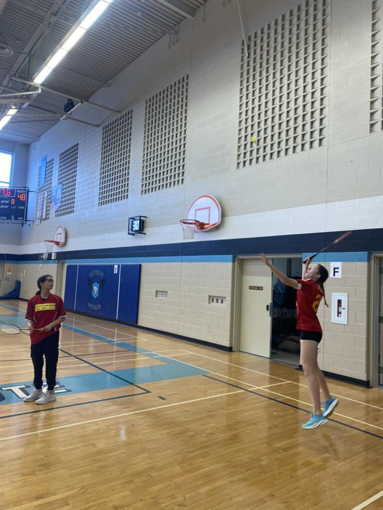 hammarskjold-team-playing-badminton
