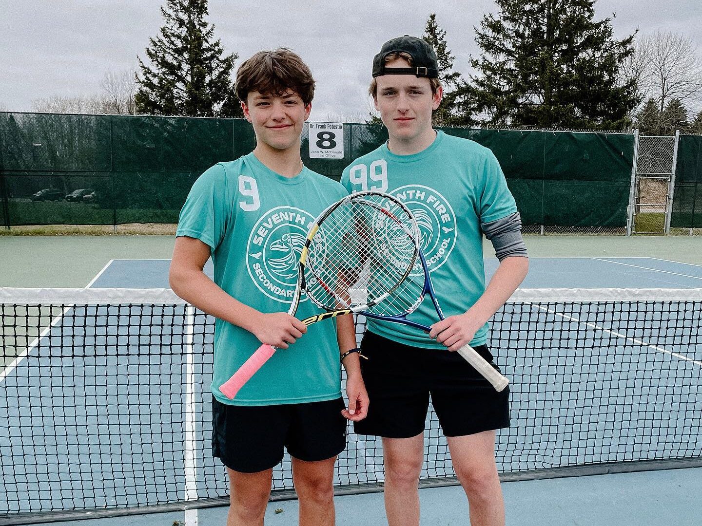 seventh-fire-two-boys-playing-tennis