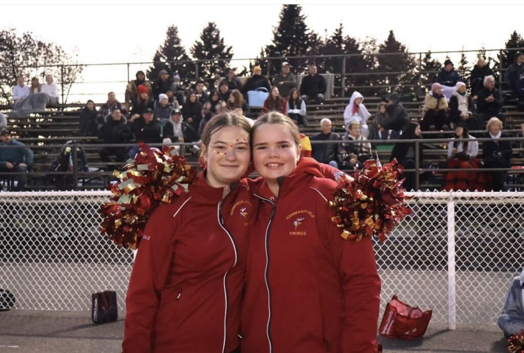 hammarskjold-cheerleading-teammates-on-field