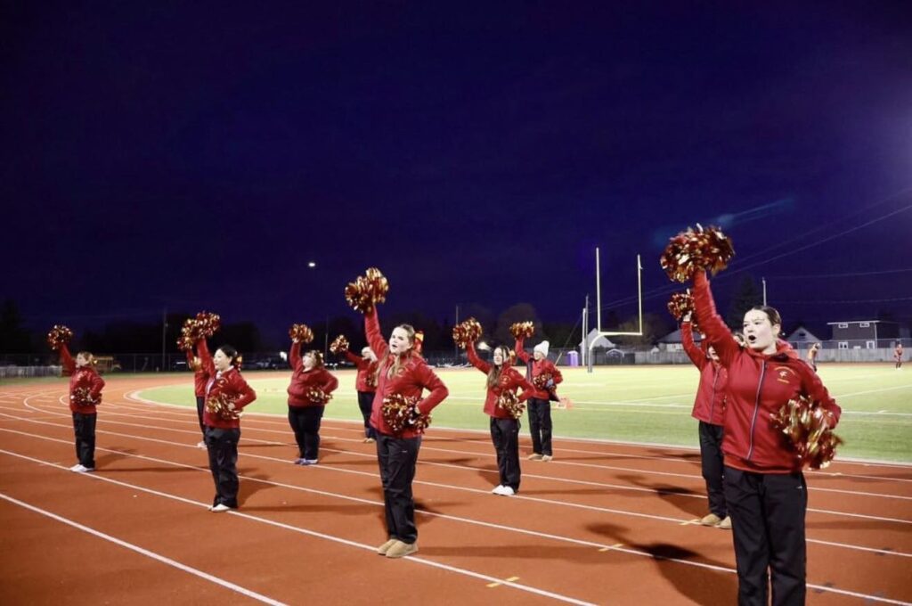hammarskjold-cheerleading-team-on-field