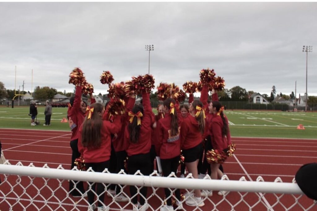 hammarskjold-cheerleading-team-on-field