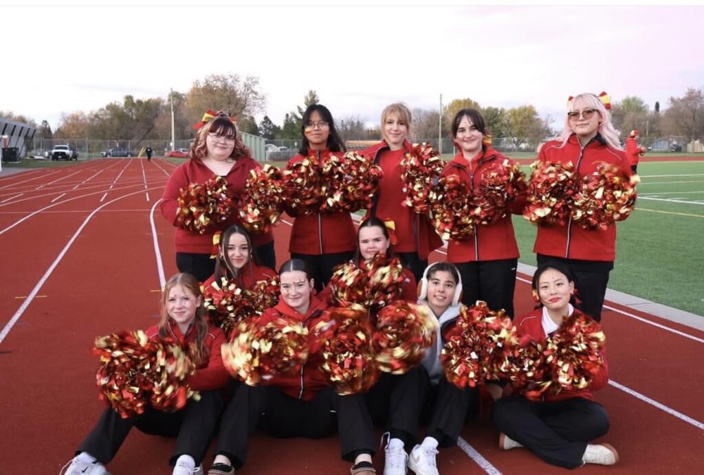 hammarskjold-cheerleading-team-on-field