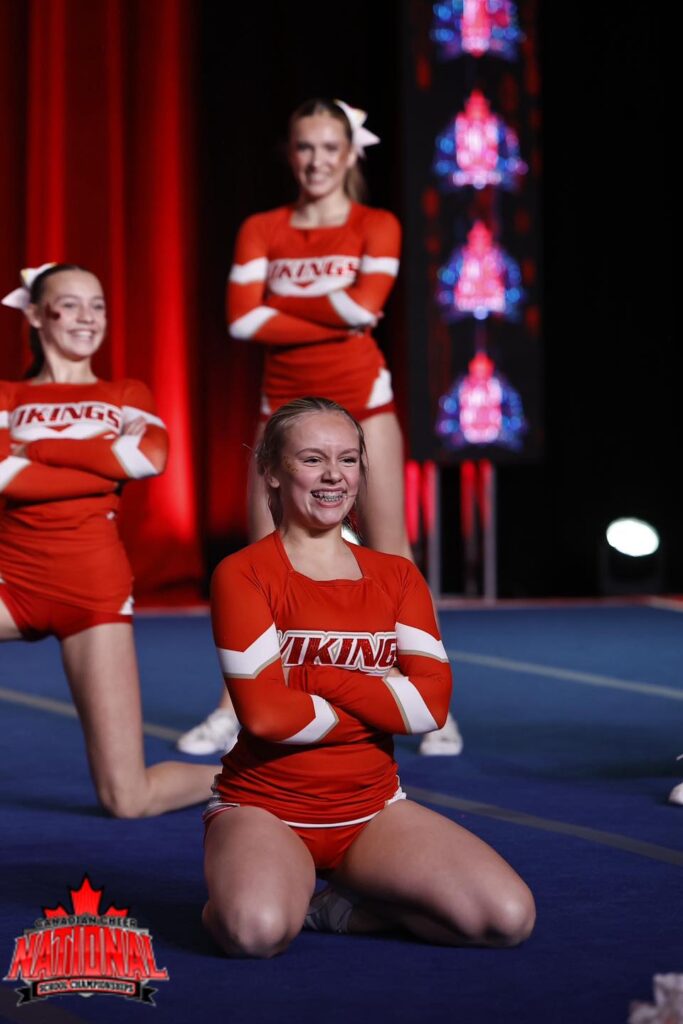 hammarskjold-cheerleading-team-competition-close-up-three-girls