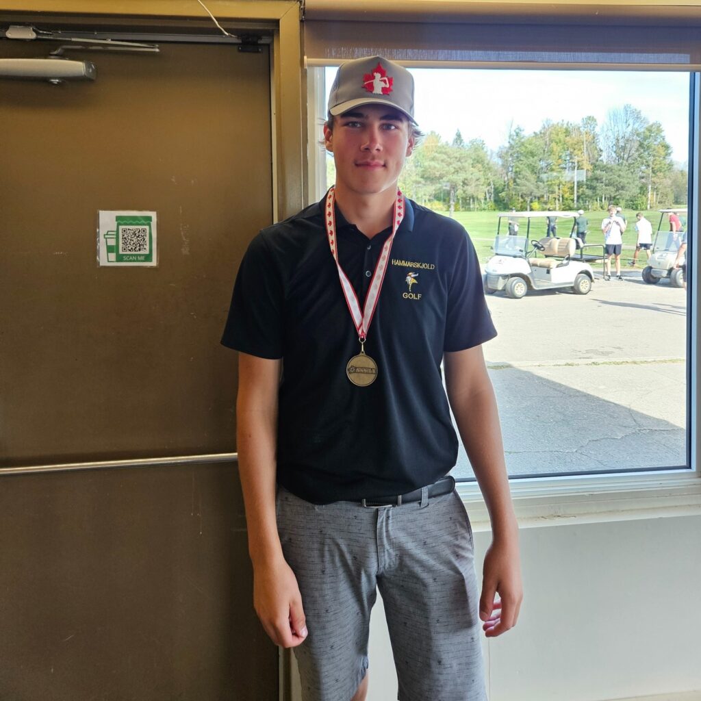 hammarskjold-golf-boy-with-metal