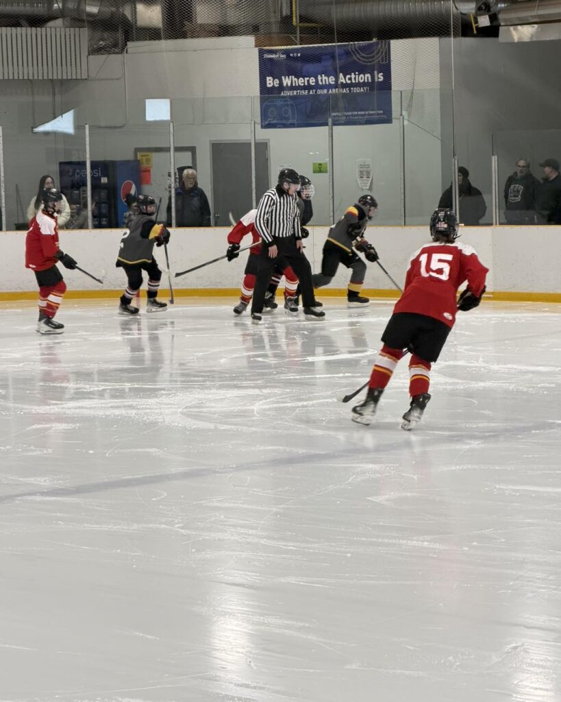hammarskjold-girls-hockey-team-playing
