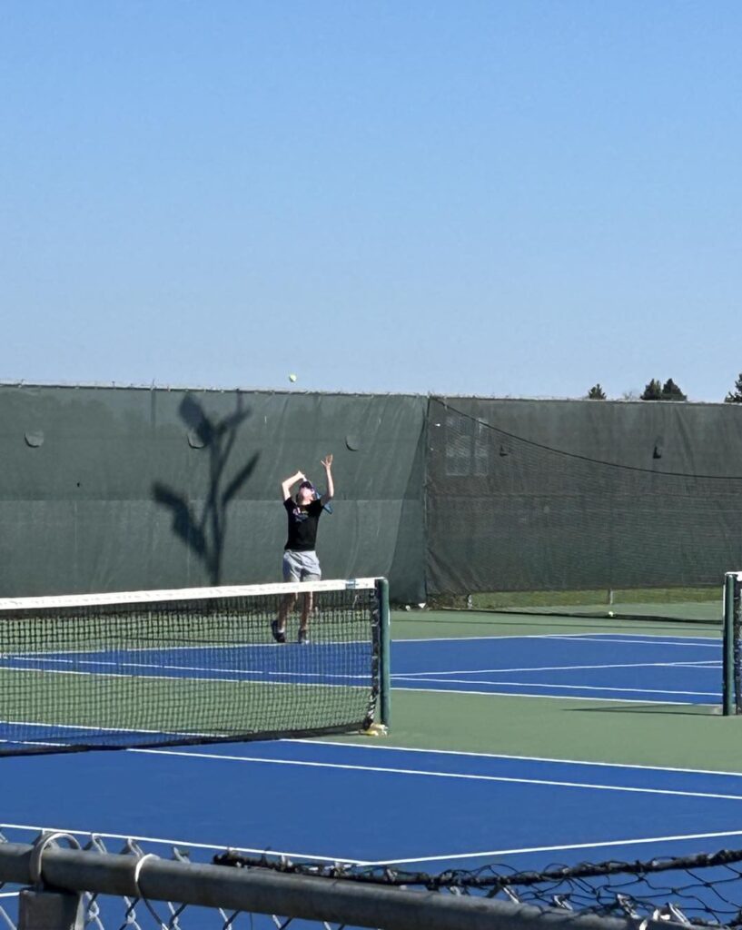 hammarskjold-tennis-team-playing