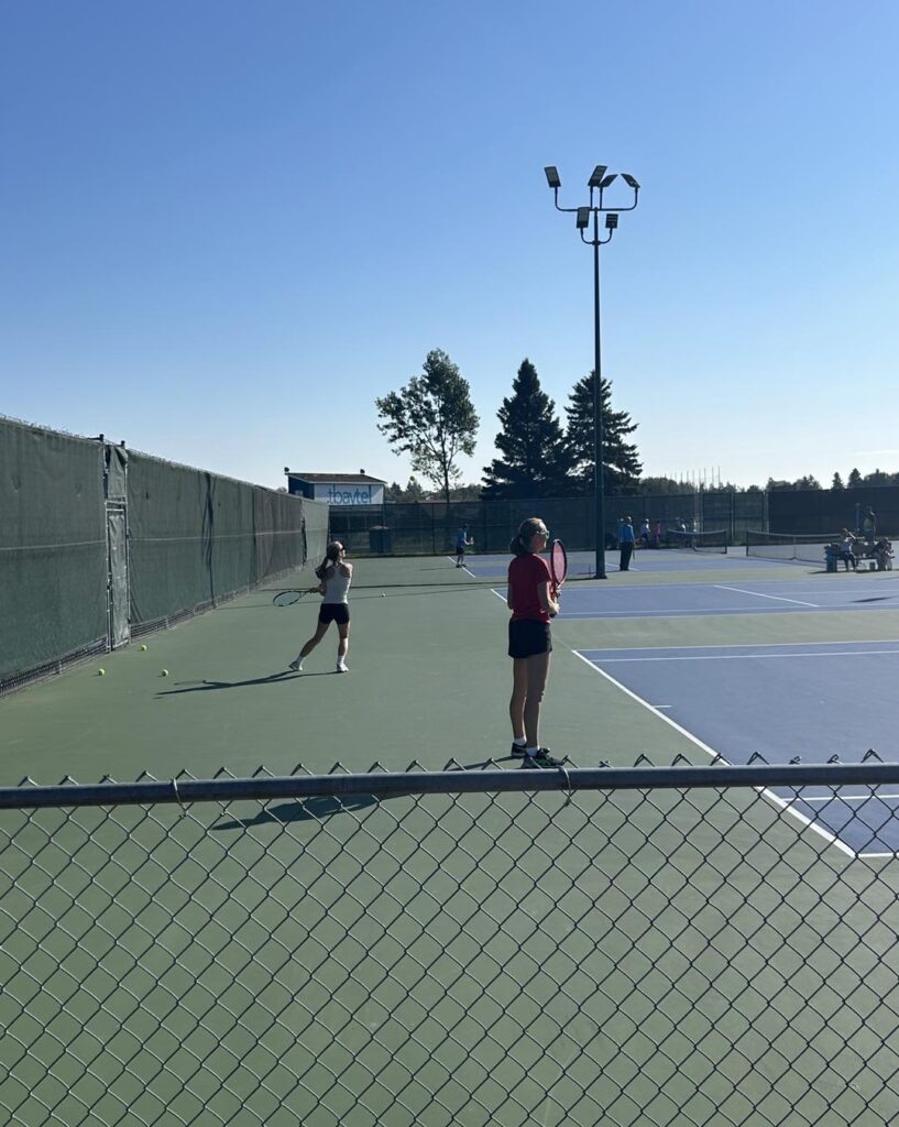 hammarskjold-tennis-team-playing