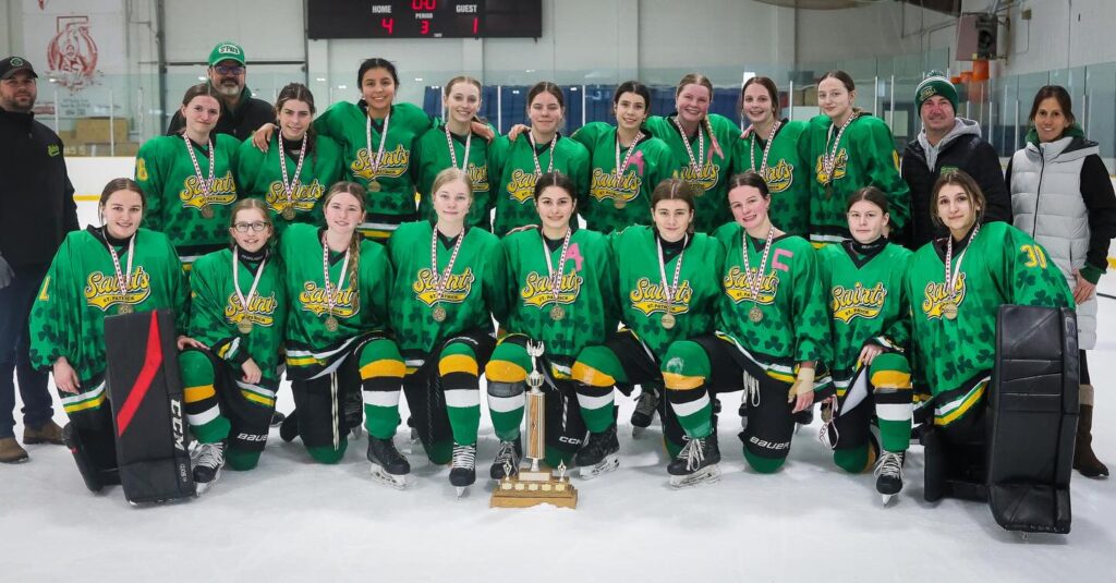 st-patrick-girls-hockey-team-with-trophy