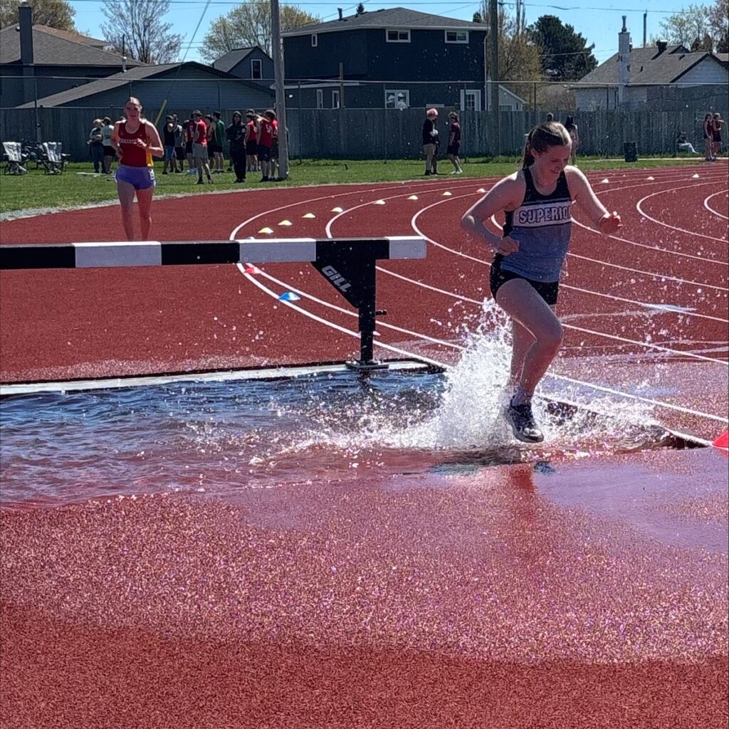 superior-track-&-field-running-through-water