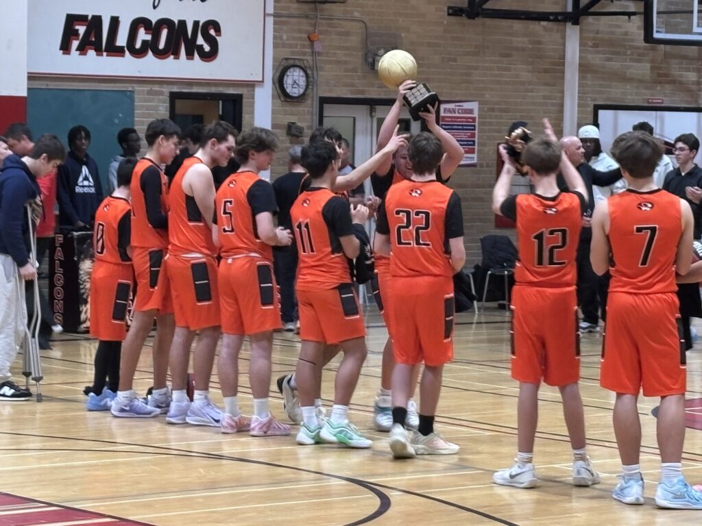 westgate-basketball-boys-team-winning-tournament-with-trophy