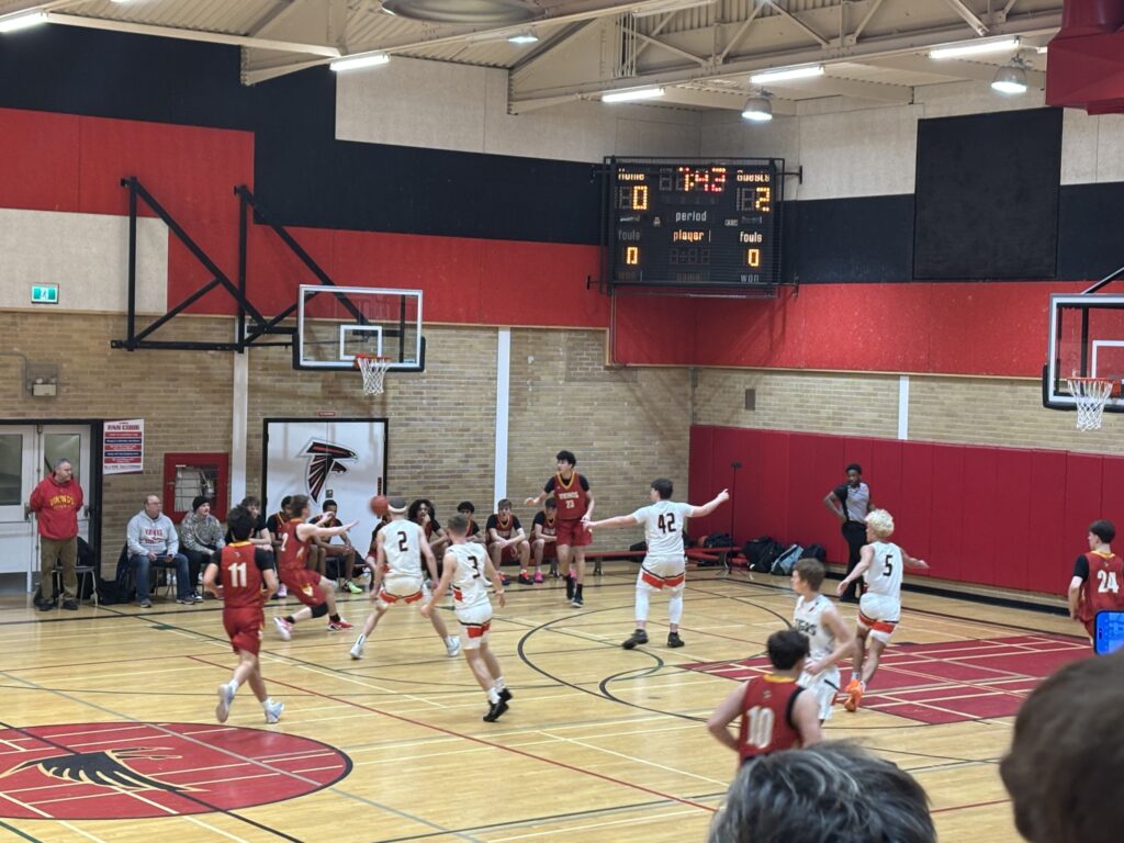 westgate-vs-hammarskjold-basketball-team