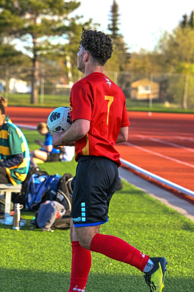 hammarskjold-boys-soccer-team-playing