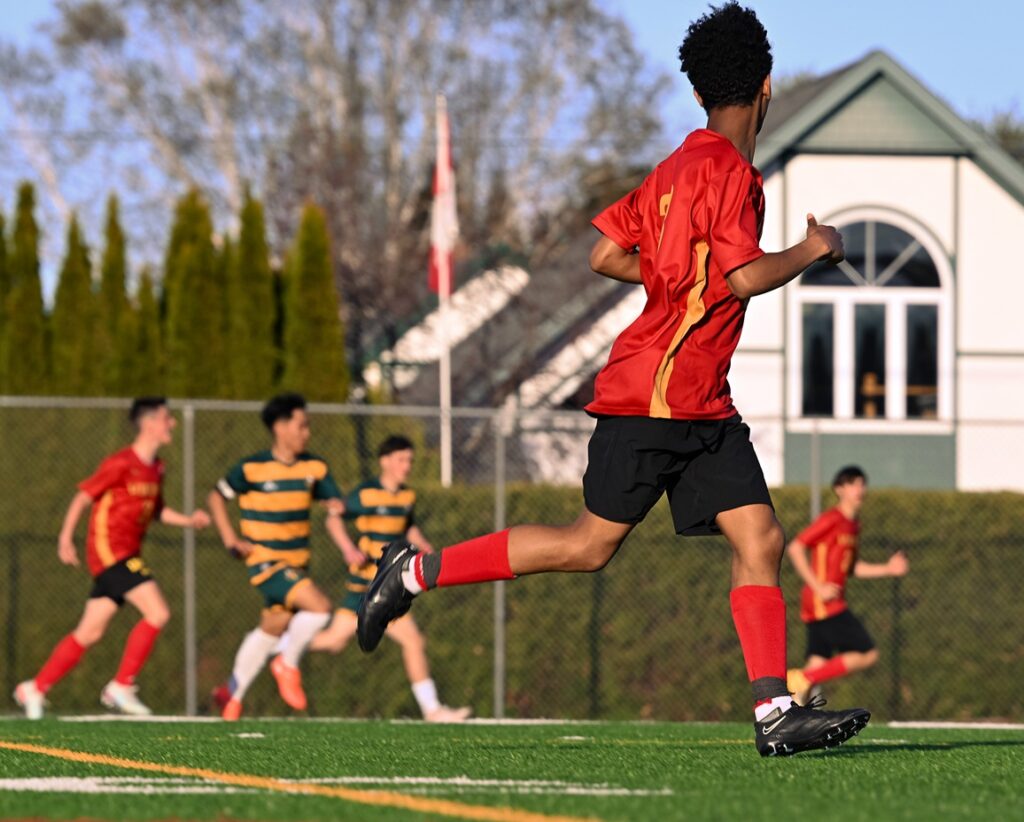 hammarskjold-boys-soccer-team-playing