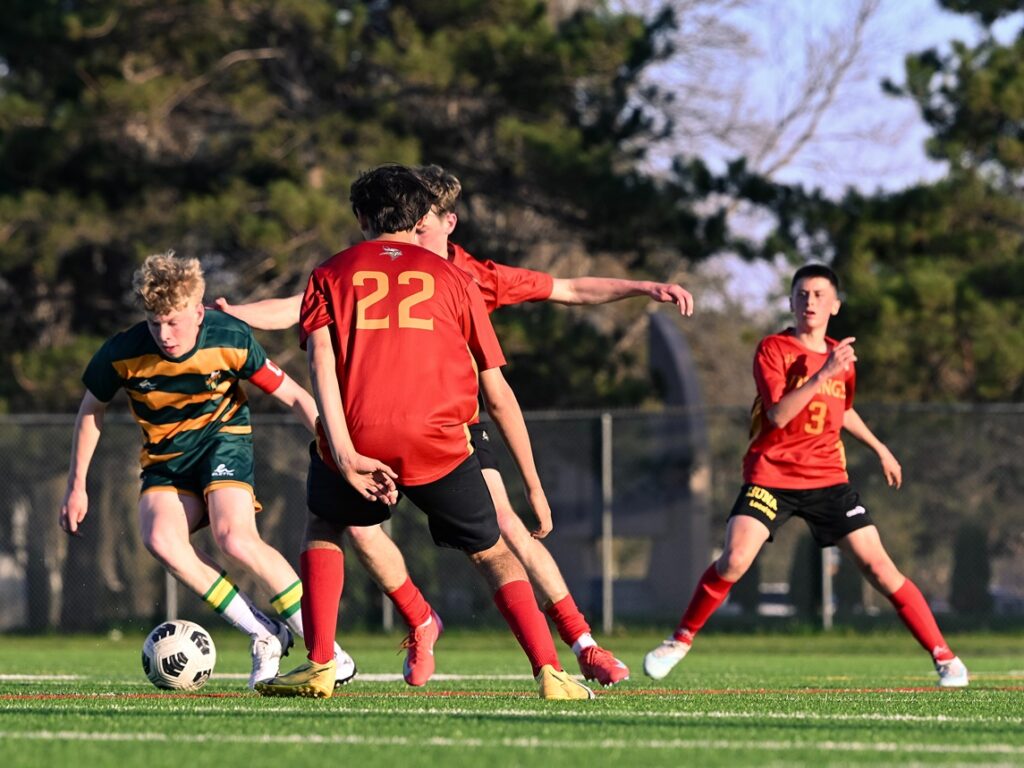 hammarskjold-st-patrick-teams-playing-final-soccer-game