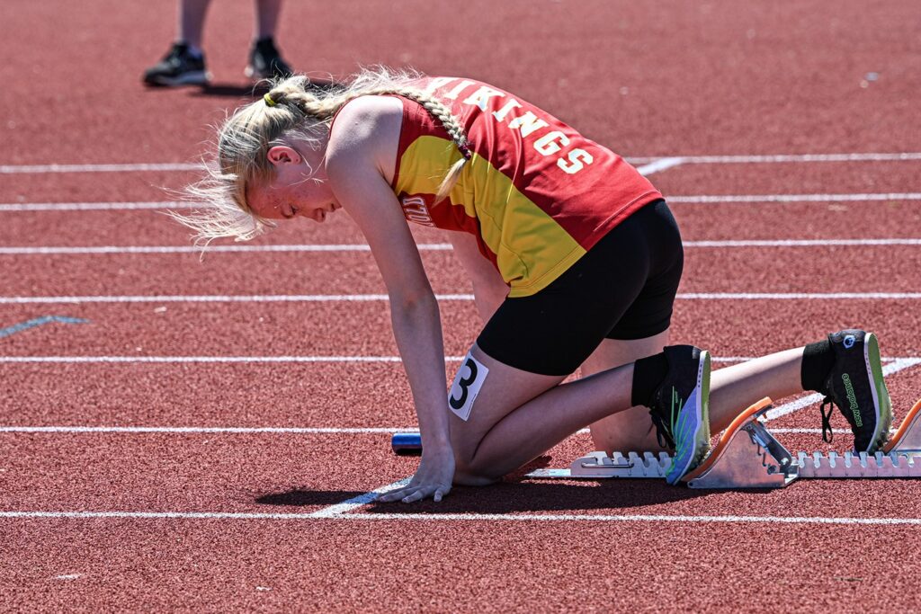 hammarskjold-track-and-field-team-girl-about-to-run