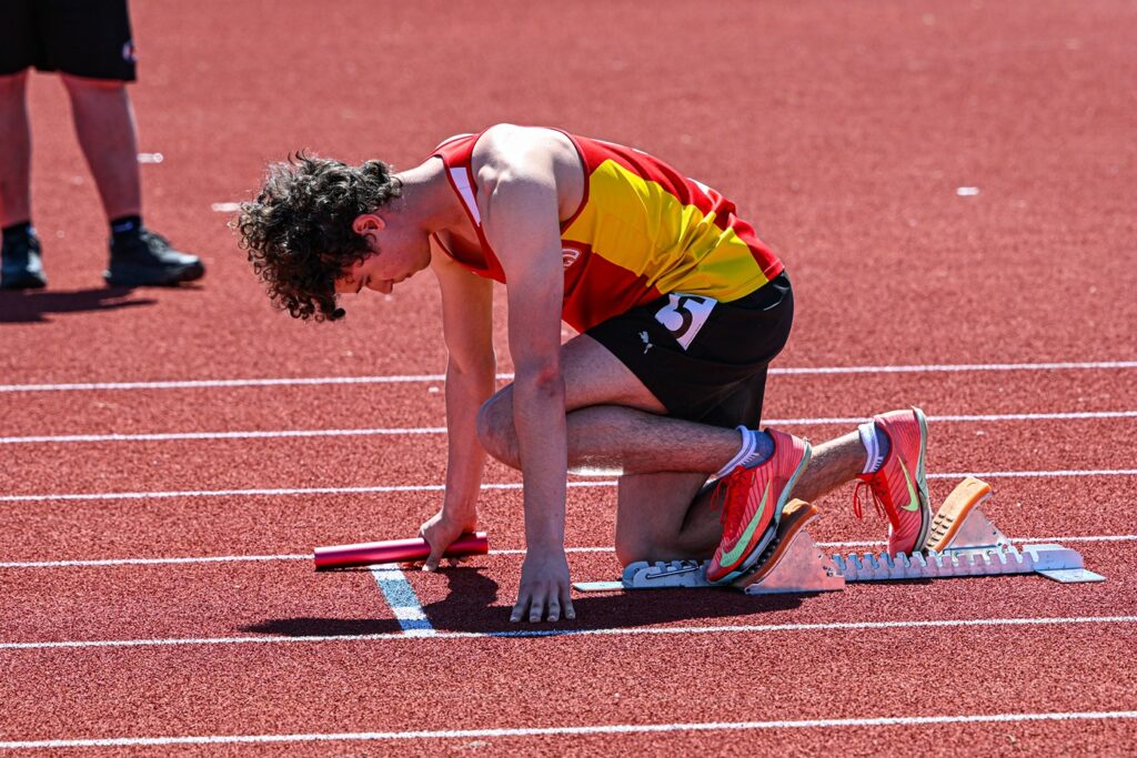 hammarskjold-track-and-field-team-boy-about-to-run