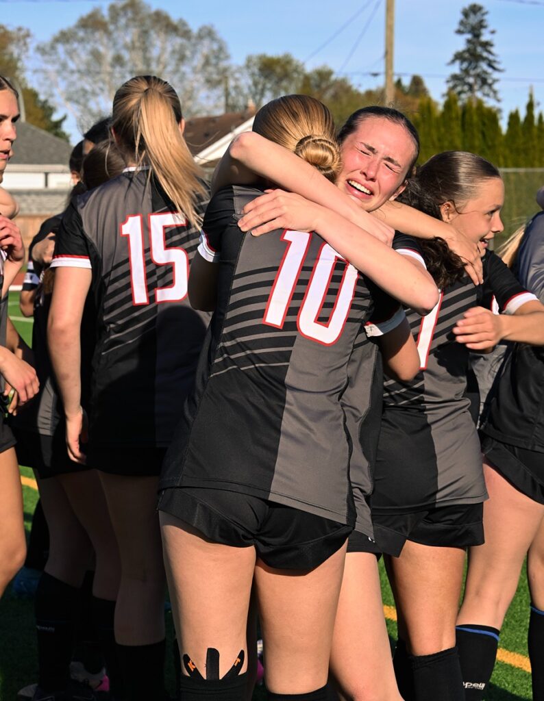 st-ignatius-girls-soccer-team-winning-celebrating