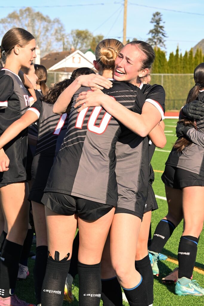 st-ignatius-girls-soccer-team-winning-celebrating