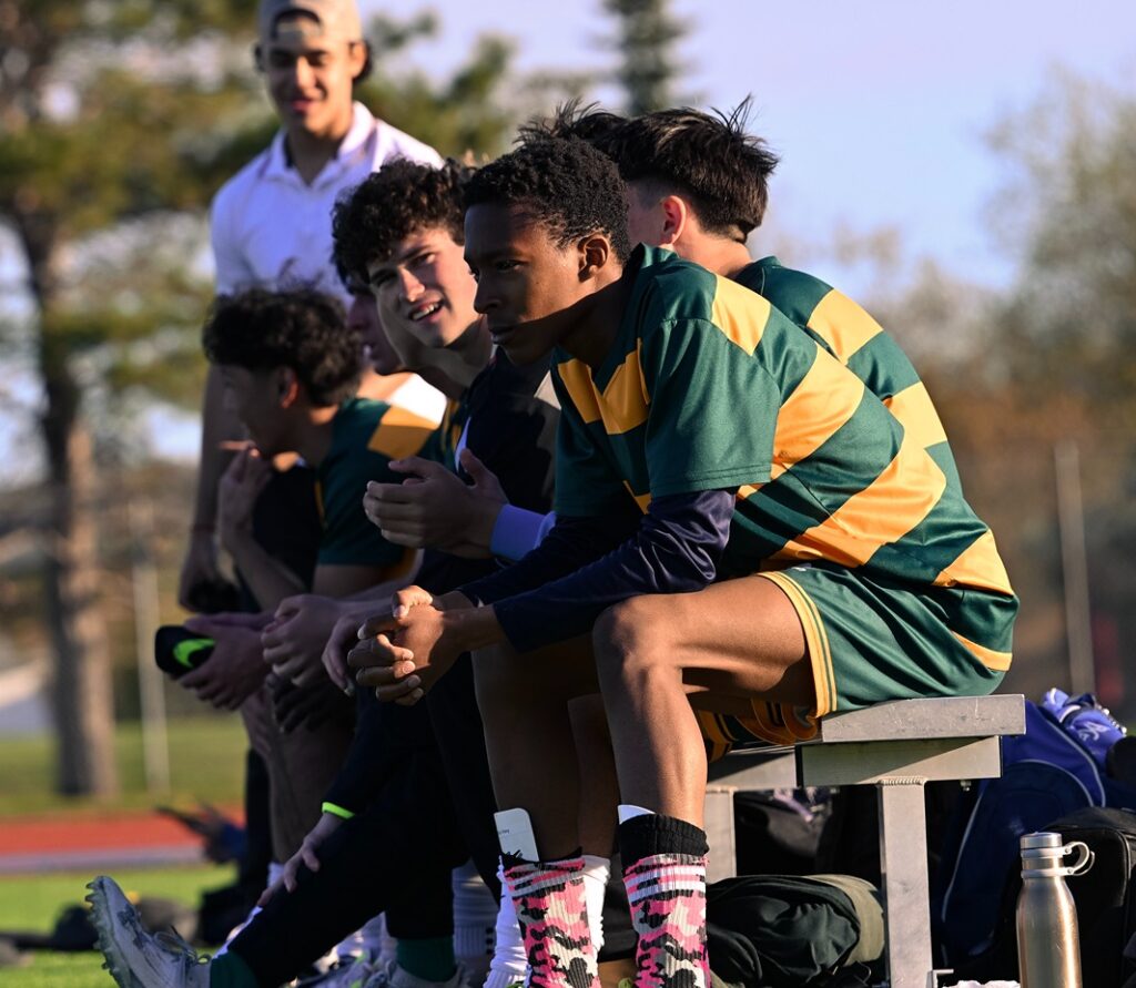 st-patrick- boys-soccer-team-players-on-bench