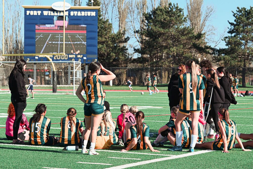 st-patrick-girls-soccer-team-team-huddle