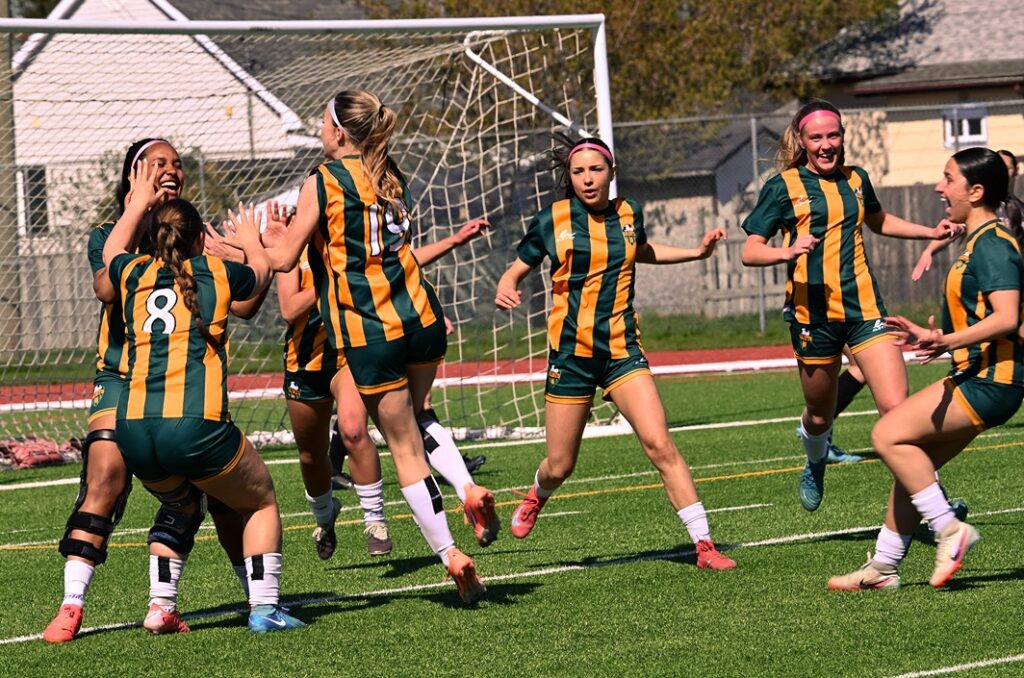 st-patrick-girls-soccer-team-playing-celebrating