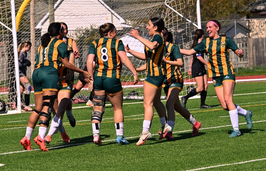 st-patrick-girls-soccer-team-playing-celebrating