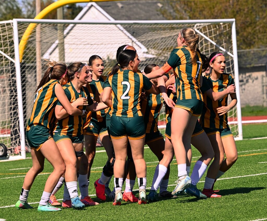 st-patrick-girls-soccer-team-playing-celebrating