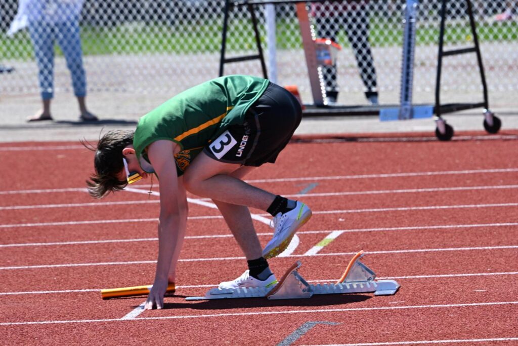 st-patrick-track-and-field-team-boy-about-to-run